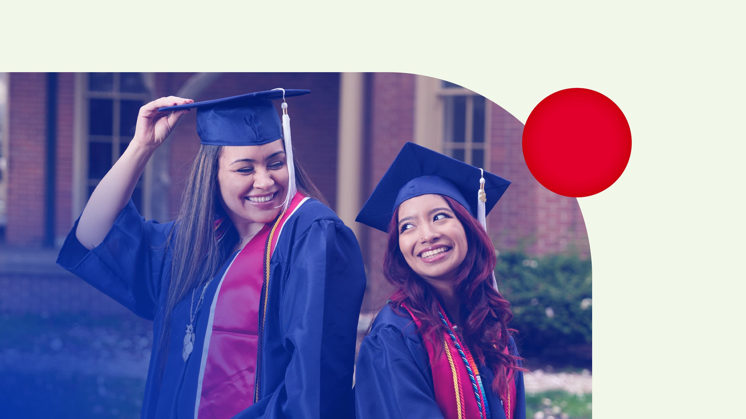 Background image with two graduating student in graduation gown smiling at each other.
